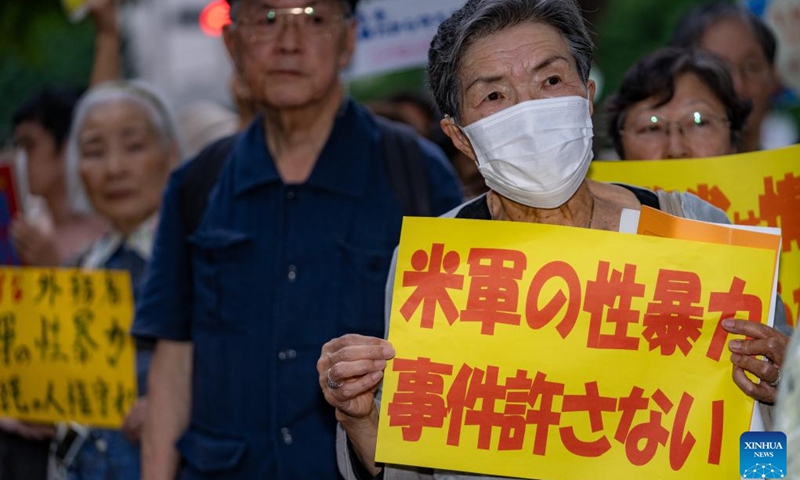 People gather in front of the country's Ministry of Foreign Affairs to protest against the Japanese government for concealing the alleged sexual assault cases involving U.S. military personnel in Japan from the public in Tokyo, Japan, July 2, 2024. (Photo: Xinhua)