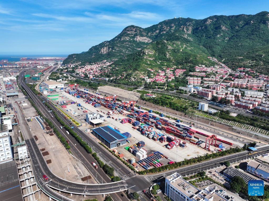 An aerial drone photo taken on June 26, 2024 shows a view of the China-Kazakhstan (Lianyungang) Logistics Cooperation Base in Lianyungang, east China's Jiangsu Province. Launched in May 2014, the China-Kazakhstan (Lianyungang) Logistics Cooperation Base is the first entity project inaugurated under the Belt and Road Initiative. It acts as the only departure port for Kazakhstan's grain transit in China and an important dry port for landlocked Central Asian countries. (Photo: Xinhua)