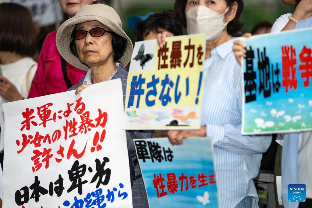 People gather in front of the country's Ministry of Foreign Affairs to protest against the Japanese government for concealing the alleged sexual assault cases involving U.S. military personnel in Japan from the public in Tokyo, Japan, July 2, 2024. (Photo: Xinhua)