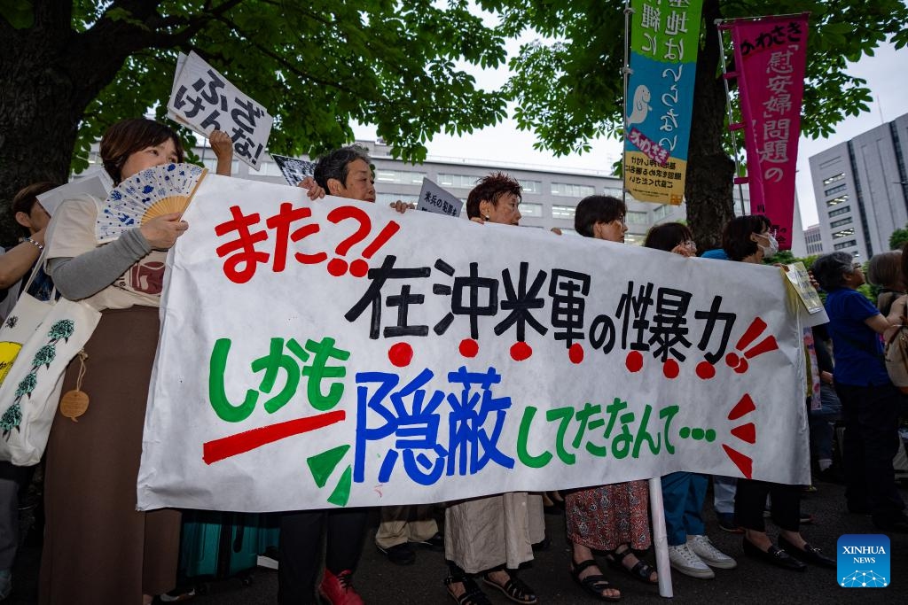 People gather in front of the country's Ministry of Foreign Affairs to protest against the Japanese government for concealing the alleged sexual assault cases involving U.S. military personnel in Japan from the public in Tokyo, Japan, July 2, 2024. (Photo: Xinhua)