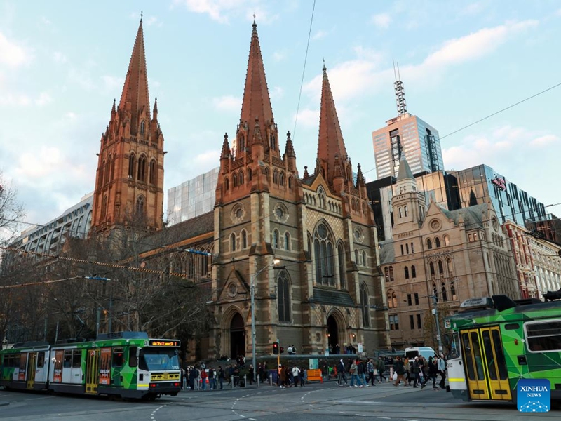 This photo taken on July 2, 2024 shows trams passing the St Paul's Cathedral in Melbourne, Australia. Photo: Xinhua