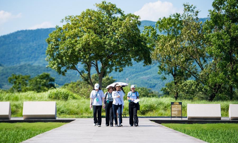 People visit the Mojiaoshan Palace Site at the Archaeological Ruins of Liangzhu City park in Hangzhou, capital city of east China's Zhejiang Province, July 4, 2024. Photo: Xinhua