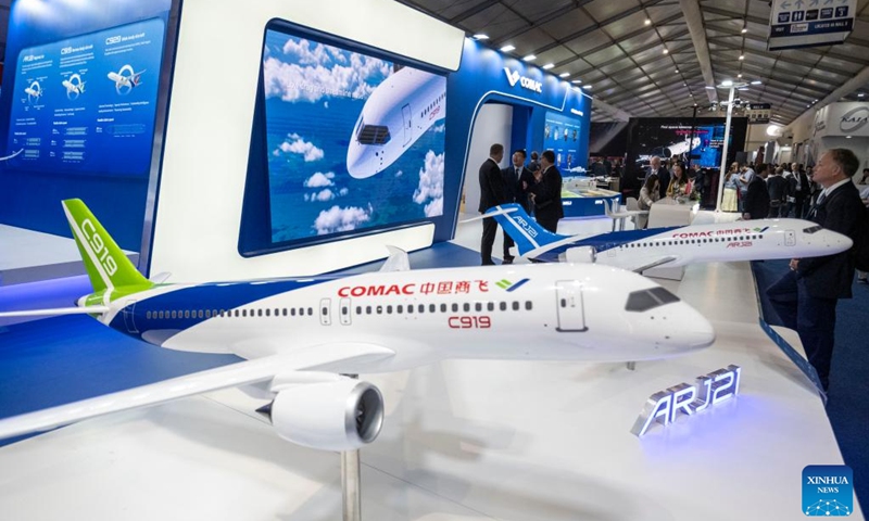 Models of the C919 and ARJ21 aircrafts are on display at the booth of aircraft developer Commercial Aircraft Corporation of China, Ltd. (COMAC) during the Farnborough International Airshow in Farnborough, Britain, July 22, 2024. The 2024 Farnborough International Airshow closed on July 26. Photo: Xinhua