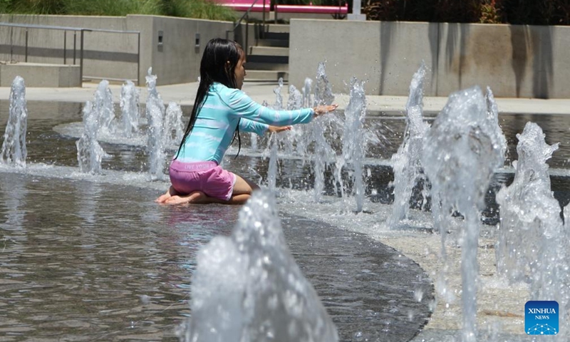 A girl cools off at a fountain in Los Angeles, California, the United States, on July 5, 2024. The U.S. National Weather Service warned on Thursday that a significant and extremely dangerous heatwave is set to build throughout the West to end this week and into the extended holiday weekend, with several days of record-breaking heat forecast. Photo: Xinhua