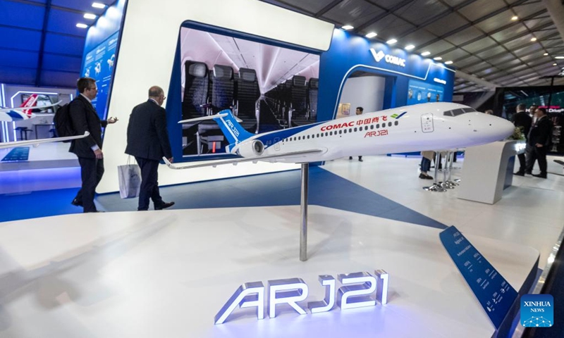 A model of the ARJ21 aircraft is on display at the booth of aircraft developer Commercial Aircraft Corporation of China, Ltd. (COMAC) during the Farnborough International Airshow in Farnborough, Britain, July 22, 2024. The 2024 Farnborough International Airshow closed on July 26. Photo: Xinhua