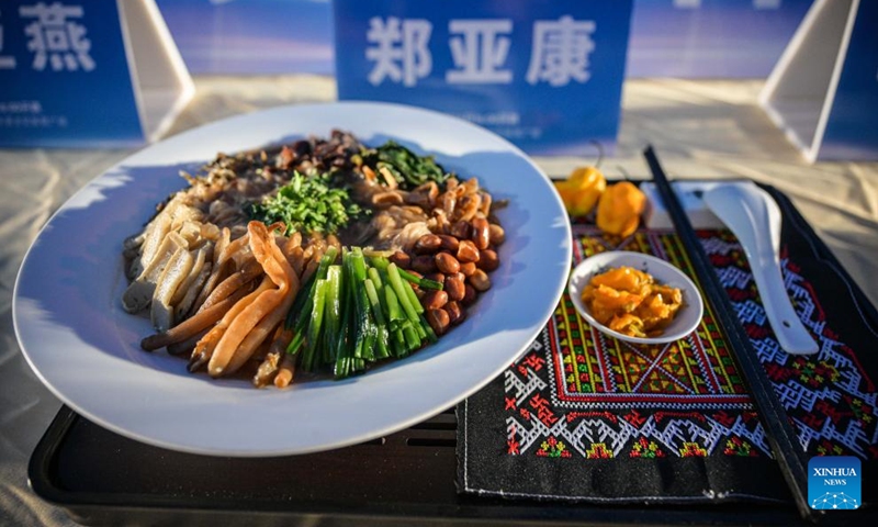 A dish of Lingshui sour rice noodles made by a competitor is pictured during a sour rice noodle cooking competition in Lingshui, south China's Hainan Province, July 26, 2024. Lingshui sour rice noodle is a popular local snack and was listed as a provincial-level intangible cultural heritage in 2009. Recently a cooking competition was held in Lingshui to promote the sour rice noodle industry. Photo: Xinhua