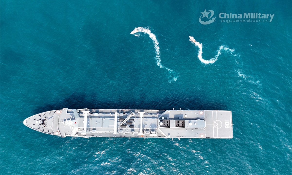 The Type 901 comprehensive supply ship Hulunhu attached to a combat support ship flotilla with the navy under the PLA Northern Theater Command sails on the sea during a maritime training exercise on June 14, 2024. (eng.chinamil.com.cn/Photo by Xu Taotao)