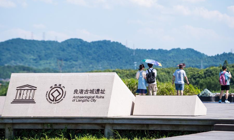 People visit the Mojiaoshan Palace Site at the Archaeological Ruins of Liangzhu City park in Hangzhou, capital city of east China's Zhejiang Province, July 4, 2024. Photo: Xinhua