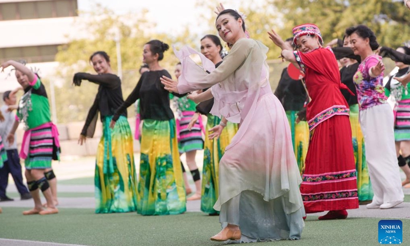 People wearing traditional Chinese ethnic costumes dance during the 2024 Chinese Cultural Heritage Festival and Vancouver Water Splashing Festival in Burnaby, British Columbia, Canada, July 27, 2024. The two-day events kicked off here on Saturday. Photo: Xinhua