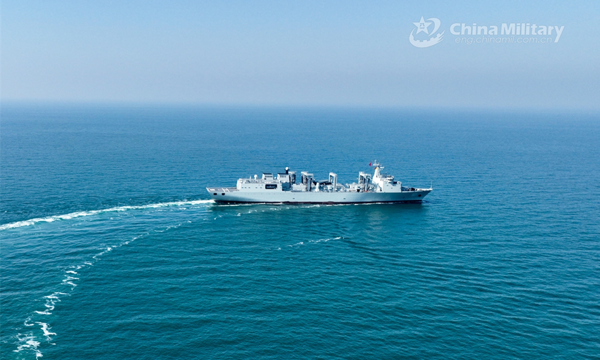 The Type 901 comprehensive supply ship Hulunhu attached to a combat support ship flotilla with the navy under the PLA Northern Theater Command sails to designated area during a maritime training exercise on June 14, 2024. (eng.chinamil.com.cn/Photo by Xu Taotao)