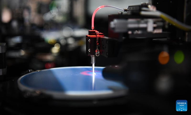 This photo taken on June 3, 2024 shows a chip testing equipment in Wuhan Precise Electronics Co., Ltd., in Wuhan, central China's Hubei Province. Wuhan East Lake High-tech Development Zone, also known as the optics valley of China, is the birthplace of China's first optical fiber and a national optoelectronic information industry base. In recent years, Hubei Province has made major breakthroughs in the development of optoelectronic information industry and accelerated the building of optoelectronic information industry clusters. Photo: Xinhua