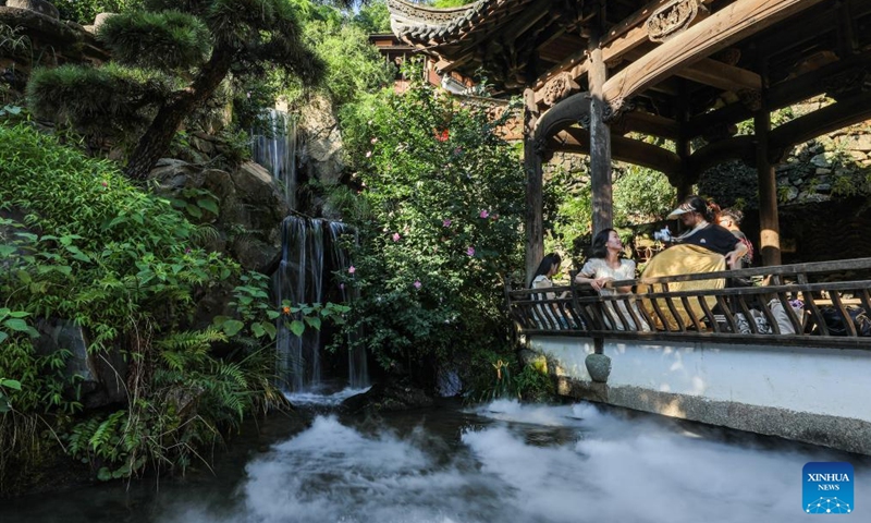 Tourists visit Huangling Village of Wuyuan County, east China's Jiangxi Province, July 3, 2024. In recent years, Wuyuan County has been making efforts to promote rural tourism by exploring and utilizing its unique natural resources and traditional culture. Photo: Xinhua