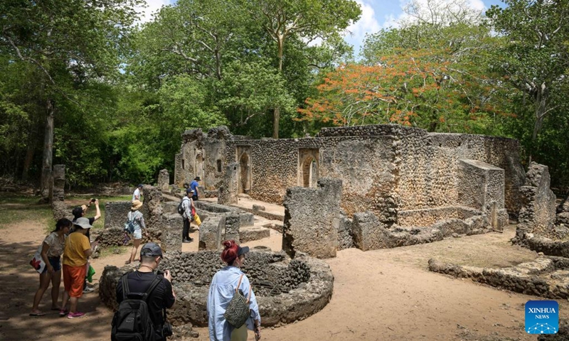 This photo taken on April 15, 2023 shows people visiting the ruins of Gedi in Kilifi County, Kenya. The historic town of Gedi in the coastal region of Kenya has been inscribed on the World Heritage List by the United Nations Educational, Scientific and Cultural Organization (UNESCO), the National Museums of Kenya (NMK) said on Saturday. (Xinhua/Han Xu)