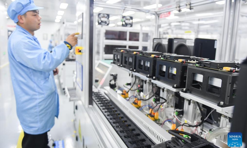 A staff member works on a production line of infrared thermal imagers at Guide Infrared Group in Wuhan, central China's Hubei Province, Feb. 28, 2024. Wuhan East Lake High-tech Development Zone, also known as the optics valley of China, is the birthplace of China's first optical fiber and a national optoelectronic information industry base. In recent years, Hubei Province has made major breakthroughs in the development of optoelectronic information industry and accelerated the building of optoelectronic information industry clusters. Photo: Xinhua