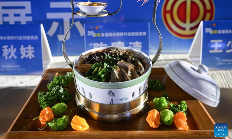 A dish of Lingshui sour rice noodles made by a competitor is pictured during a sour rice noodle cooking competition in Lingshui, south China's Hainan Province, July 26, 2024. Lingshui sour rice noodle is a popular local snack and was listed as a provincial-level intangible cultural heritage in 2009. Recently a cooking competition was held in Lingshui to promote the sour rice noodle industry. Photo: Xinhua