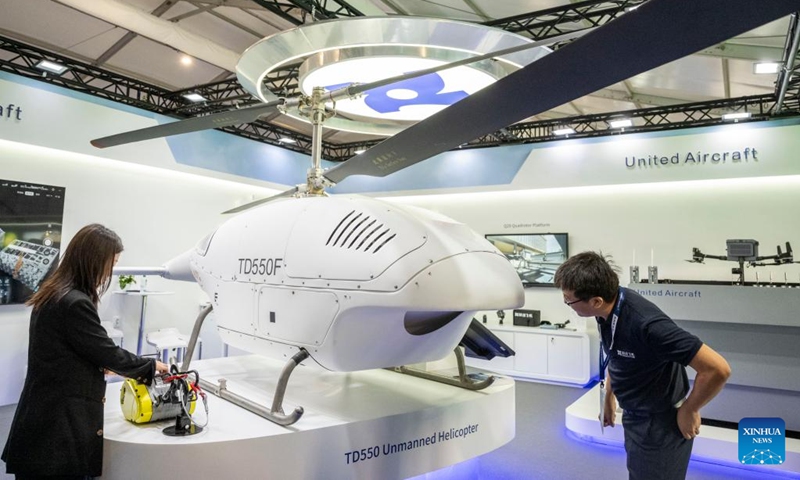 A model of an unmanned helicopter is on display at the booth of Shenzhen United Aircraft Technology Co., Ltd, during the Farnborough International Airshow in Farnborough, Britain, July 22, 2024. The 2024 Farnborough International Airshow closed on July 26. Photo: Xinhua