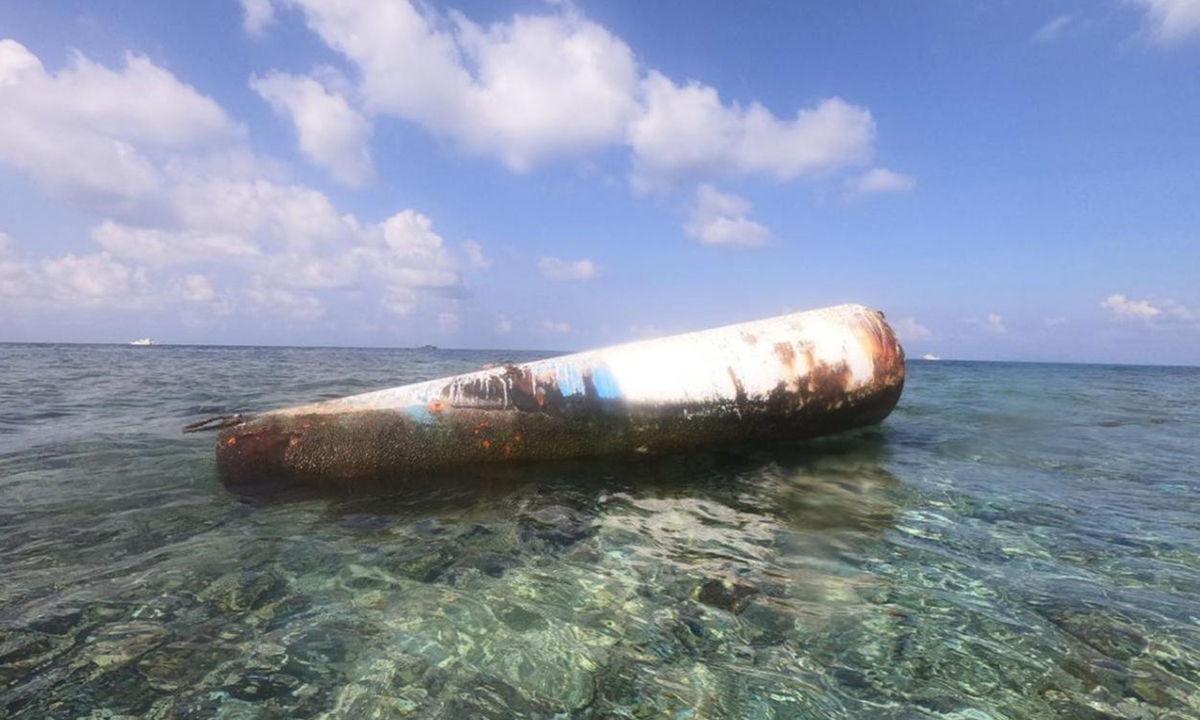 Photos taken by scientists show buoys and the dead corals underneath on the north side of the illegally 