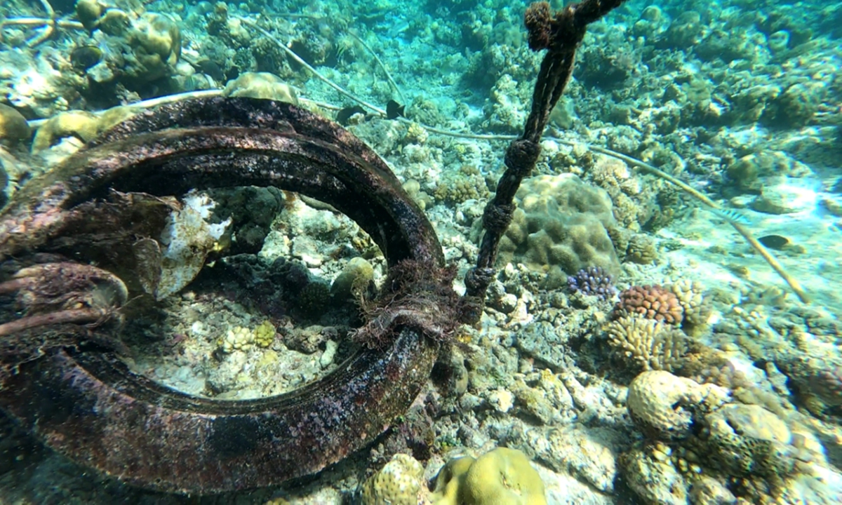 Photos taken by scientists show buoys and the dead corals underneath on the north side of the illegally 