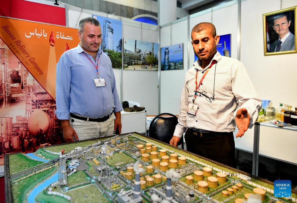 People attend the SyrPetro 2024, an international petroleum and mineral resources exhibition, in Damascus, Syria, on July 8, 2024. (Photo: Xinhua)