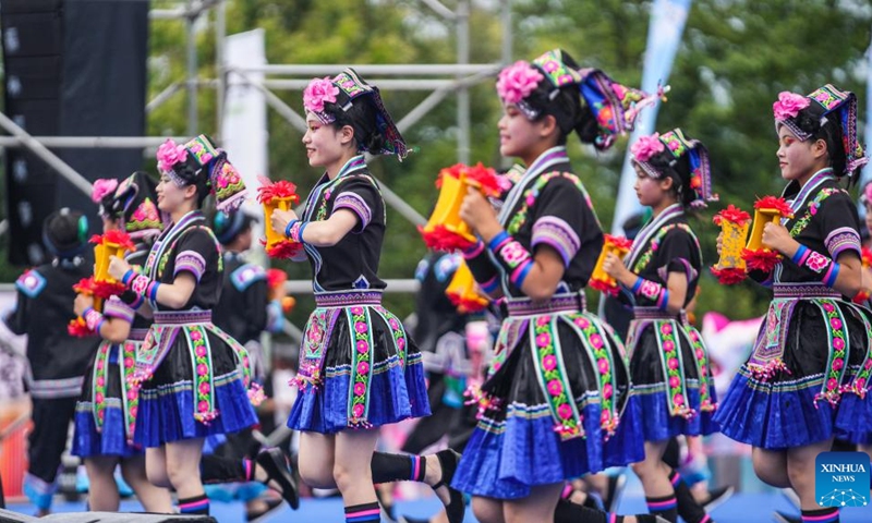 People dance during the celebration of Liuyueliu, an ethnic festival, in Liupanshui, southwest China's Guizhou Province, July 11, 2024. A series of cultural activities have been held during the celebration. (Photo: Xinhua)