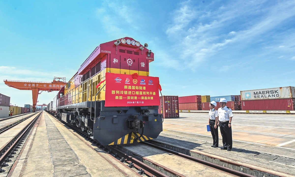 A cold-chain train loaded with Thai durians arrives at a land port in Nanchang, East China's Jiangxi Province on July 11, 2024, marking the opening of the port's first cold-chain freight train for imported products. The train has opened up a new channel of international transportation for the province's high-quality agricultural products being shipped abroad, and global fresh fruits entering the Chinese market. Photo: VCG