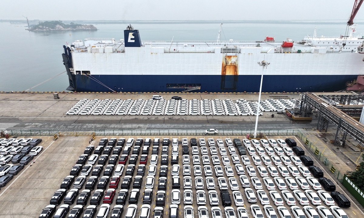 A cargo ship docks at a berth to load export vehicles at a terminal of Lianyungang Port in East China's Jiangsu province on July 11,<strong></strong> 2024. China has exported about 485,000 cars to the world. Photo: VCG