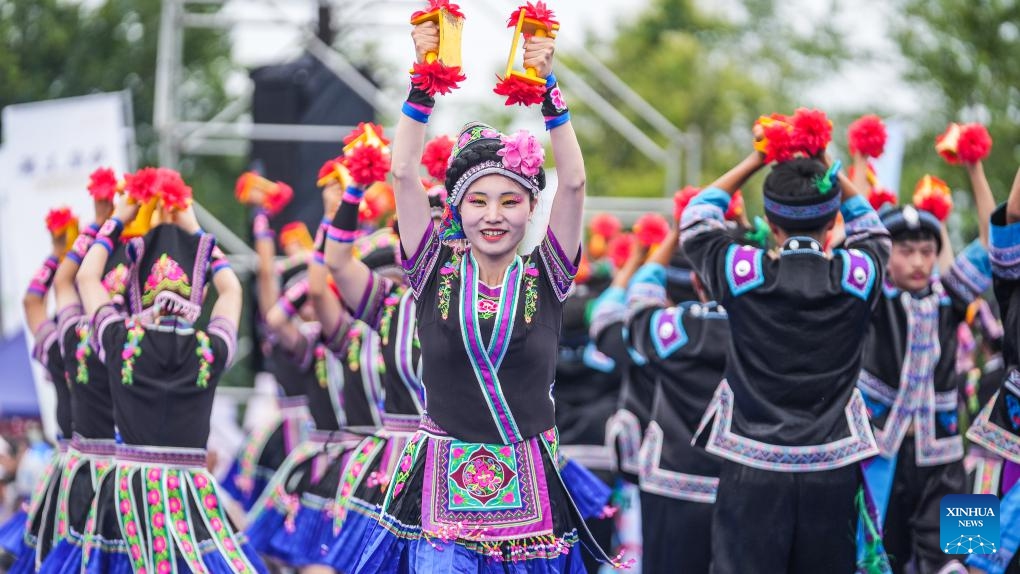 People take part in the celebration of Liuyueliu, an ethnic festival, in Liupanshui, southwest China's Guizhou Province, July 11, 2024. A series of cultural activities have been held during the celebration. (Photo: Xinhua)