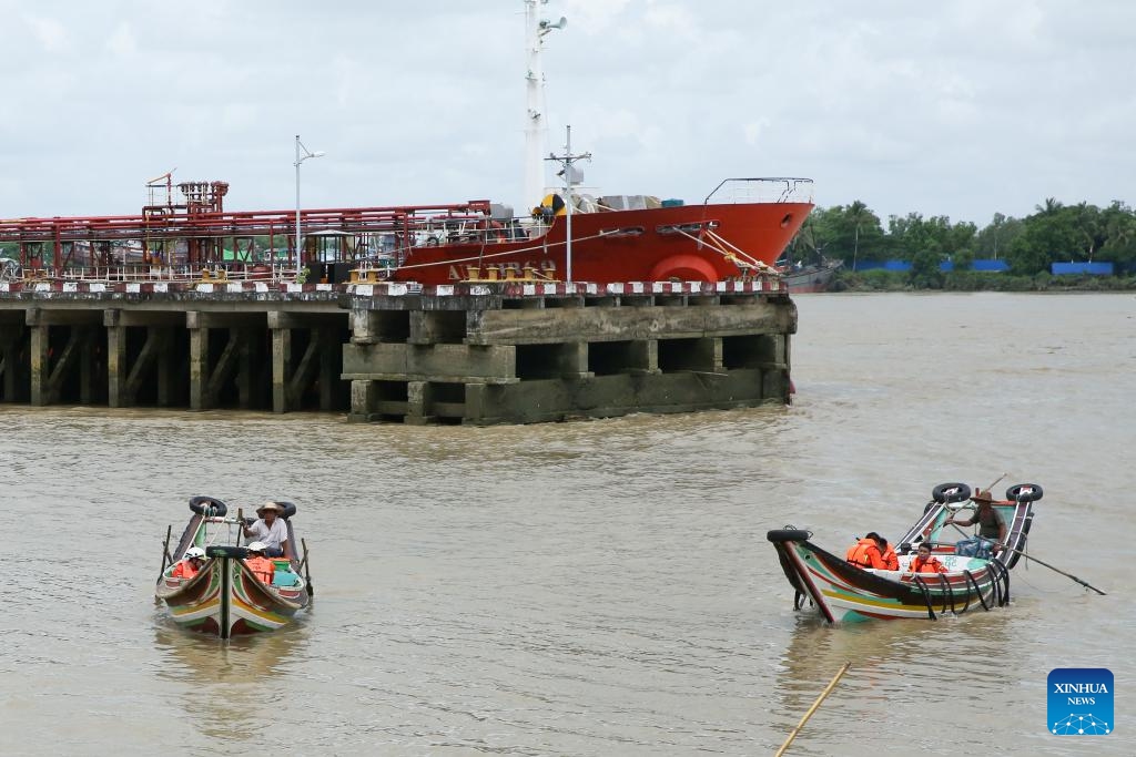 Rescuers search for missing people after a ferry accident in a river in Yangon, Myanmar, July 10, 2024. Eight people, including three students, are missing after a ferry carrying 16 passengers capsized in a river in Yangon, Myanmar, an official from a rescue organization told Xinhua on Wednesday. (Photo: Xinhua)