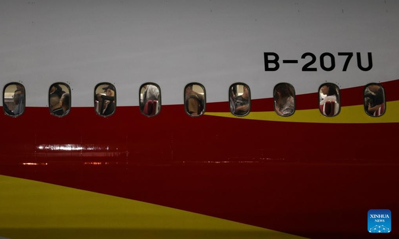 A passenger aircraft of China's Hainan Airlines lands at the Benito Juarez International Airport in Mexico City, Mexico, July 13, 2024.