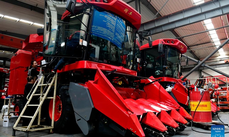 A staff member works at a factory of agricultural machinery in Da'an Town of Jining City, east China's Shandong Province, July 13, 2024. In recent years, Da'an Town has made efforts to develop the agricultural machinery industry. At present, the town is home to an industrial cluster comprising over 100 agricultural machinery-related enterprises. (Xinhua/Guo Xulei)