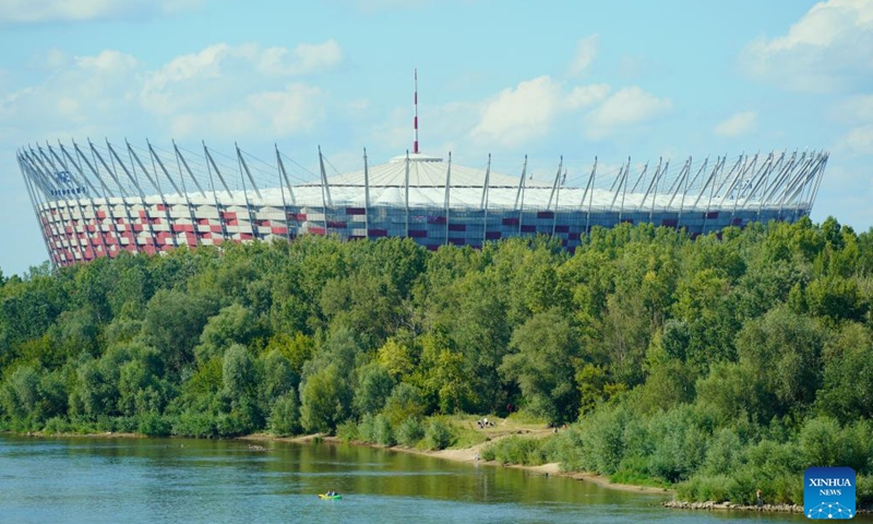 Kayakers paddle on the Vistula River in Warsaw, Poland, July 14, 2024. (Photo by Jaap Arriens/Xinhua)