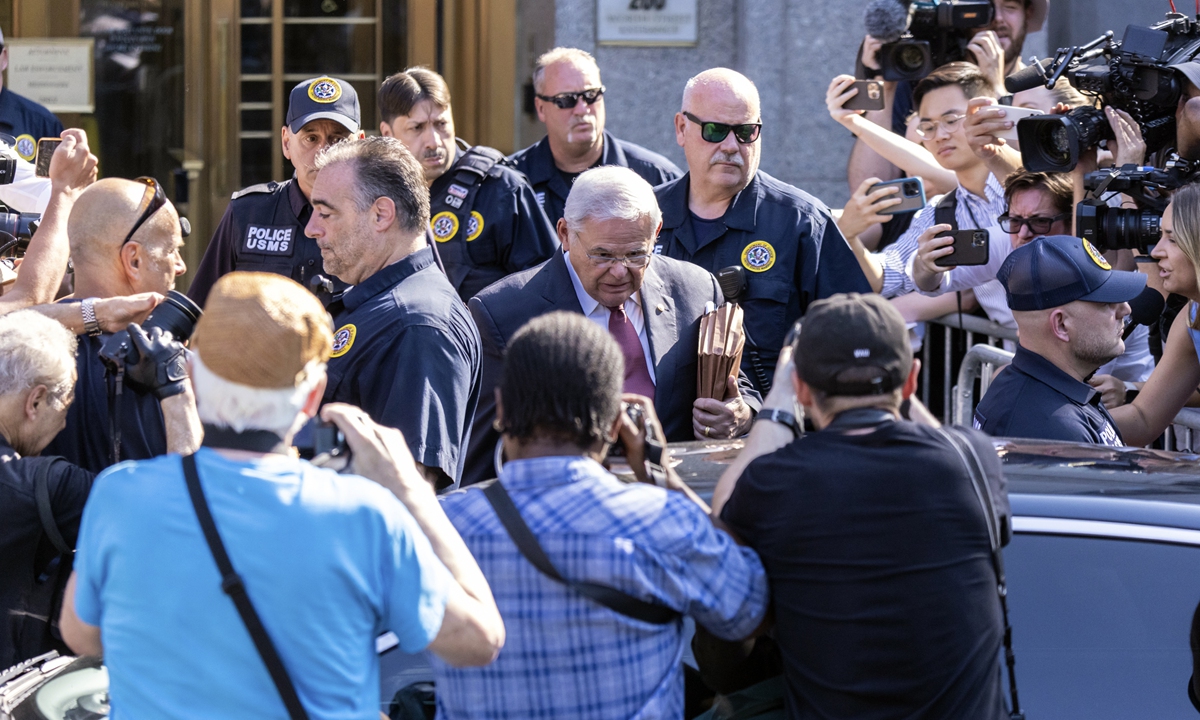 Senator Robert Menendez, a Democrat from New Jersey, center, exits Manhattan federal court in New York on July 15 (local time), 2024. Jurors at the corruption trial ended a second day of deliberations without a verdict after asking the judge about two bribery charges and whether they must be unanimous to acquit on any count. Photo: VCG