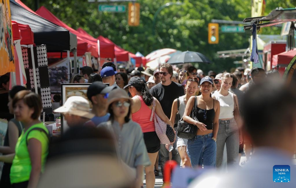 People attend the 2024 Chinatown Festival in Vancouver, British Columbia, Canada, July 14, 2024. (Photo: Xinhua)