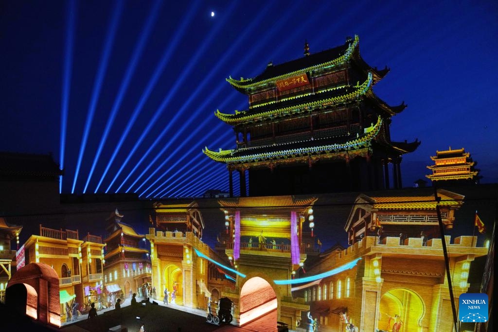 This photo taken on July 14, 2024 shows a night view at the Jiayu Pass scenic area in the city of Jiayuguan, northwest China's Gansu Province. The Jiayu Pass is the starting point of a section of the Great Wall constructed during the Ming Dynasty (1368-1644). The pass also served as a vital passage on the ancient Silk Road. (Photo: Xinhua)