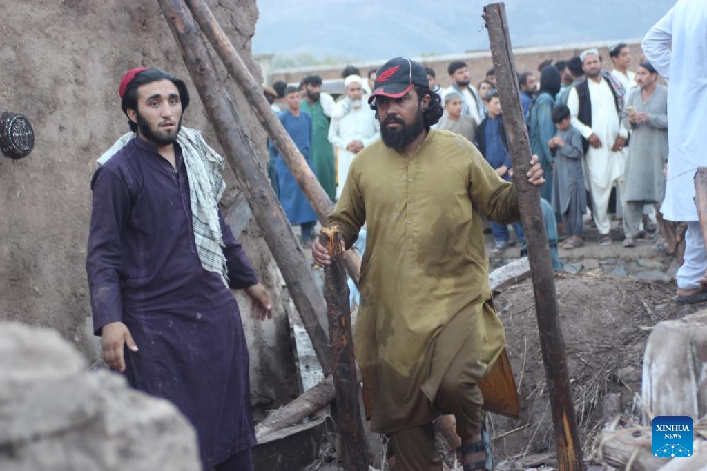 People check the damage after a flash flood in Surkh Rod District, Nangarhar province, Afghanistan, on July 15, 2024. (Photo: Xinhua)