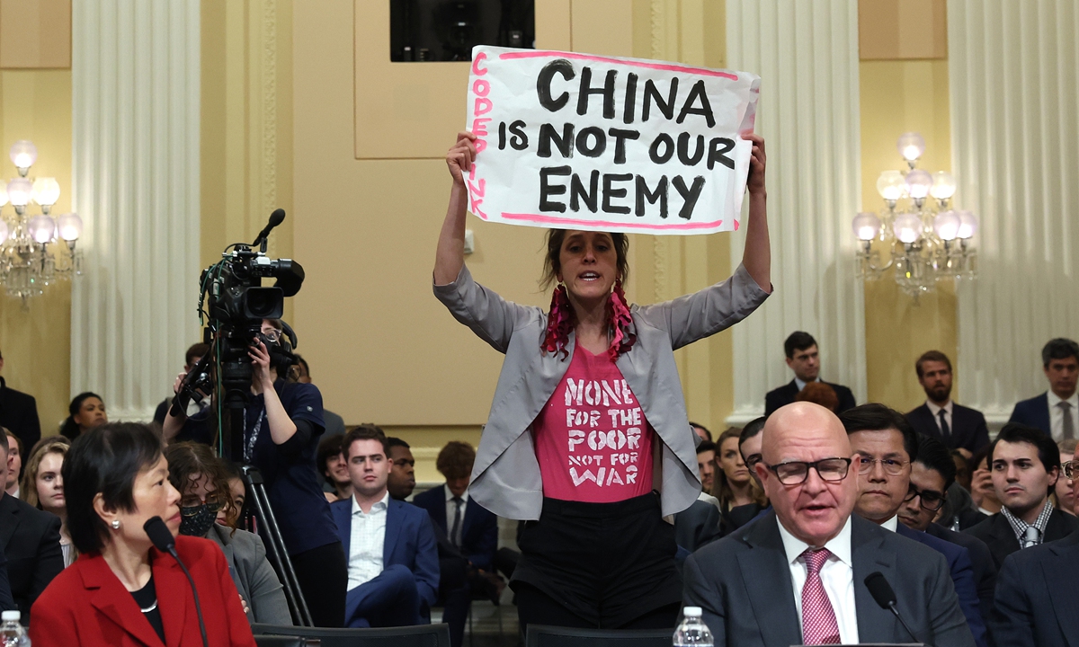 A protester from Code Pink interrupts former US national security adviser H. R. McMaster as he testifies during the first hearing held by the US' House China Select Committee in Washington on February 28,<strong></strong> 2023. Photo: VCG 