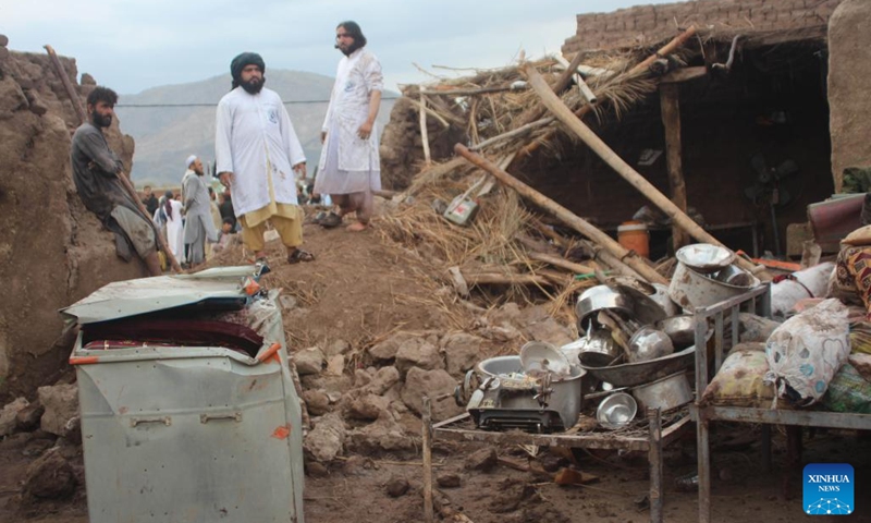 People check the damage after a flash flood in Surkh Rod District, Nangarhar province, Afghanistan, on July 15, 2024. (Photo: Xinhua)