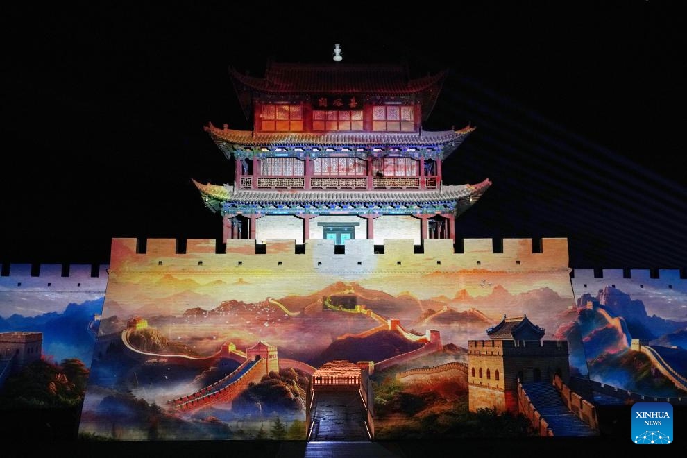 This photo taken on July 14, 2024 shows a night view at the Jiayu Pass scenic area in the city of Jiayuguan, northwest China's Gansu Province. The Jiayu Pass is the starting point of a section of the Great Wall constructed during the Ming Dynasty (1368-1644). The pass also served as a vital passage on the ancient Silk Road. (Photo: Xinhua)