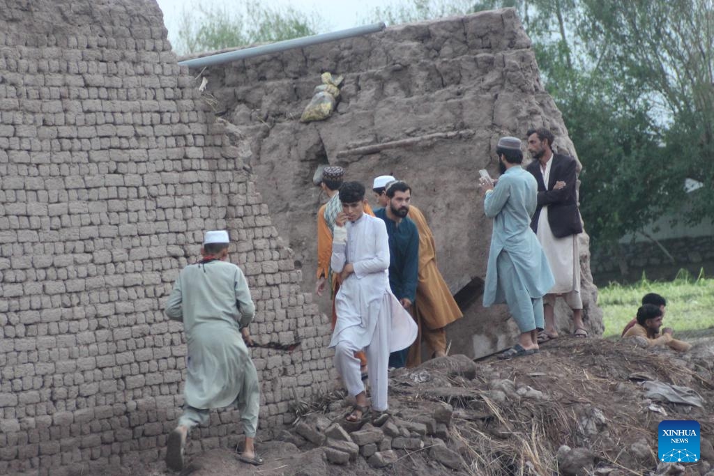 People check the damage after a flash flood in Surkh Rod District, Nangarhar province, Afghanistan, on July 15, 2024. (Photo: Xinhua)