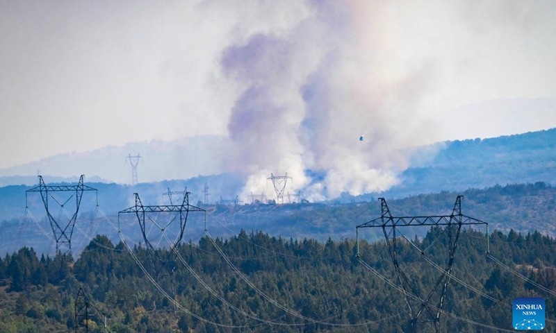 Smoke billows out of the fire-hit Serta mountain near Negotino, North Macedonia on July 16, 2024. (Photo: Xinhua)