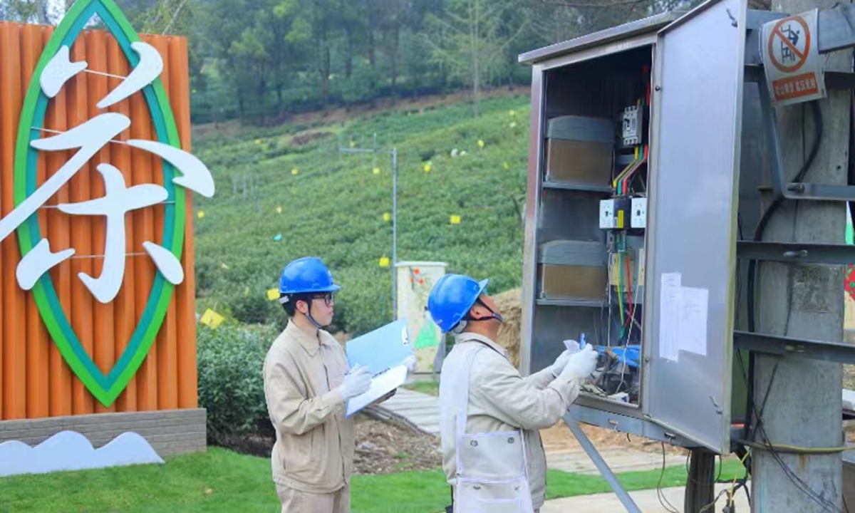 State Grid Changzhou Electric Power Supply Company workers carry out routine checks.