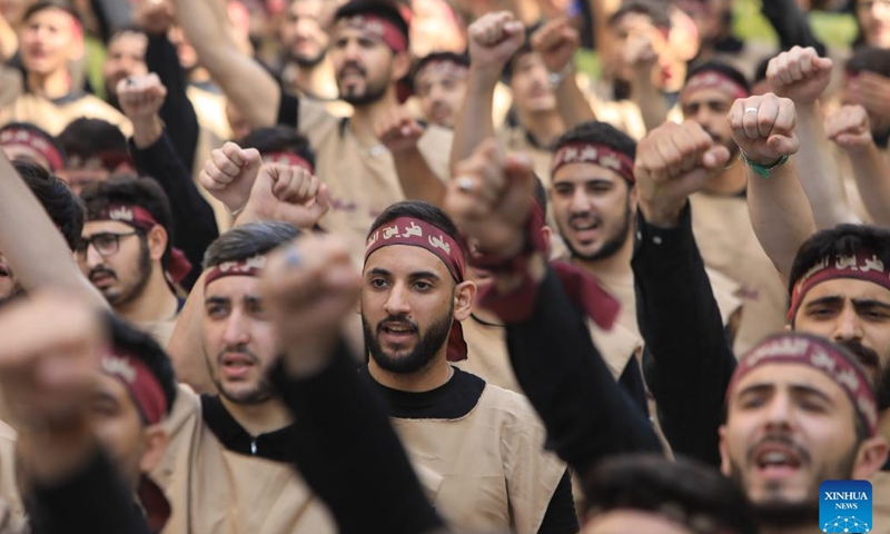 Supporters attend an Ashura ceremony in Beirut, Lebanon, on July 17, 2024. Hezbollah leader Sayyed Hassan Nasrallah said on Wednesday that Lebanon's war with Israel will not stop as long as the offensive against Gaza continues. In a televised speech marking the Islamic holy day of Ashura, Nasrallah warned Israel against going too far in targeting civilians in southern Lebanon, saying it will push its group to launch missiles and target new settlements that were not previously targeted. (Photo: Xinhua)