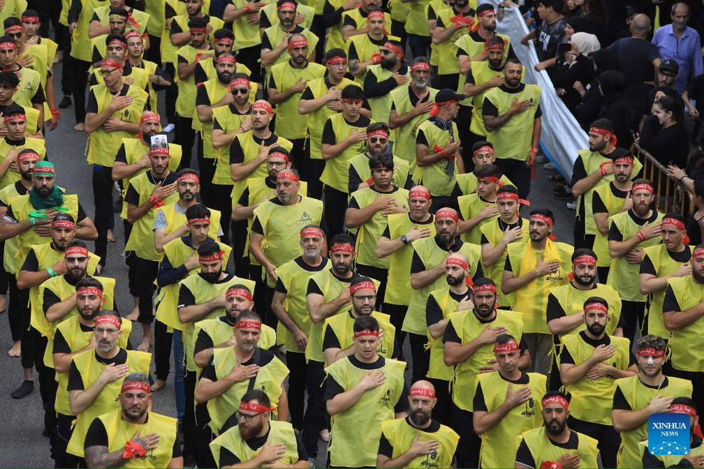 Supporters attend an Ashura ceremony in Beirut, Lebanon, on July 17, 2024. Hezbollah leader Sayyed Hassan Nasrallah said on Wednesday that Lebanon's war with Israel will not stop as long as the offensive against Gaza continues. In a televised speech marking the Islamic holy day of Ashura, Nasrallah warned Israel against going too far in targeting civilians in southern Lebanon, saying it will push its group to launch missiles and target new settlements that were not previously targeted. (Photo: Xinhua)