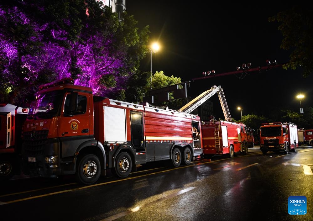 This photo taken on July 18, 2024 shows firefighting vehicles at the rescue site of a department store fire in Zigong City, southwest China's Sichuan Province. (Photo: Xinhua)