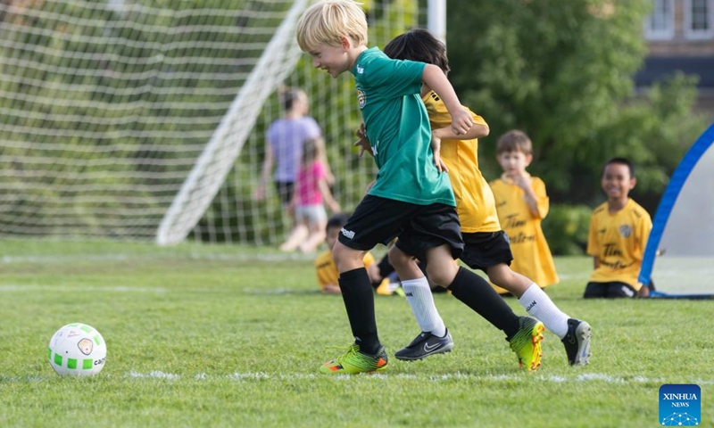 Children compete at a soccer training class during summer vacation in Toronto, Canada, on July 17, 2024. (Photo: Xinhua)