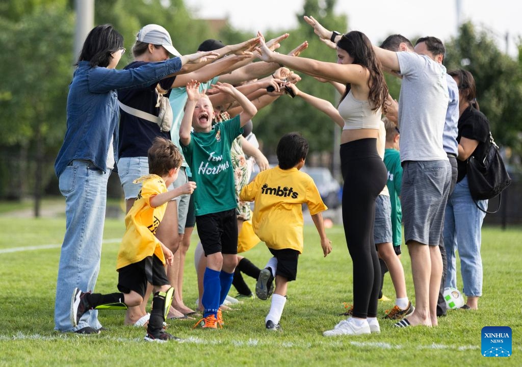 Children compete at a soccer training class during summer vacation in Toronto, Canada, on July 17, 2024. (Photo: Xinhua)