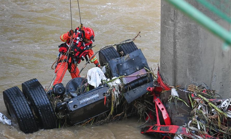 A rescuer works at the site of a bridge collapse in Zhashui County in Shangluo City, Northwest China's Shaanxi Province, July 21, 2024. Photo: Xinhua