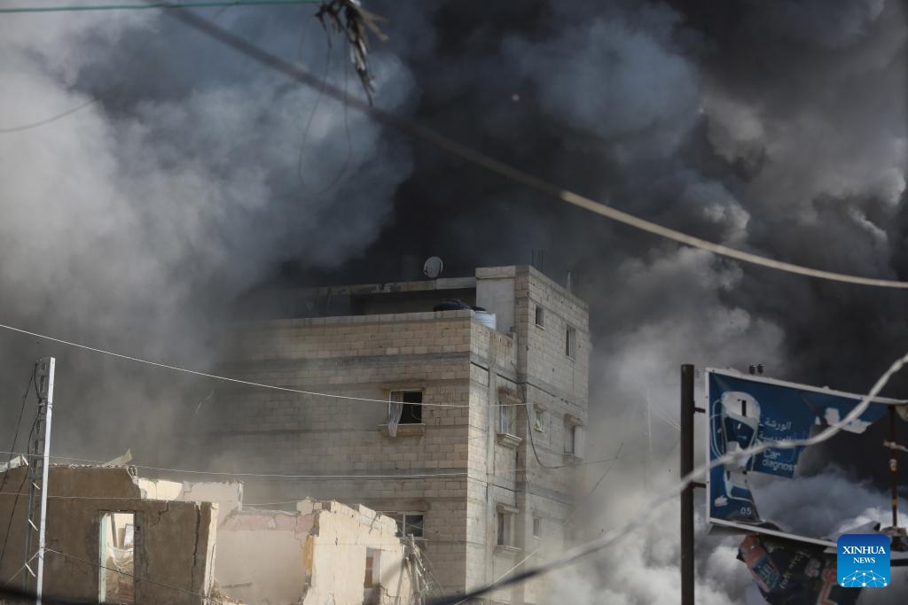 Smoke rises following an Israeli airstrike on a residential apartment in the Nuseirat refugee camp in central Gaza, July 21, 2024. The Israeli army has bombed the central Gazan refugee camp of Nuseirat 63 times in seven days, killing 91 Palestinians and injuring 251 others, the Hamas-run Gaza government media office said Sunday. (Photo: Xinhua)