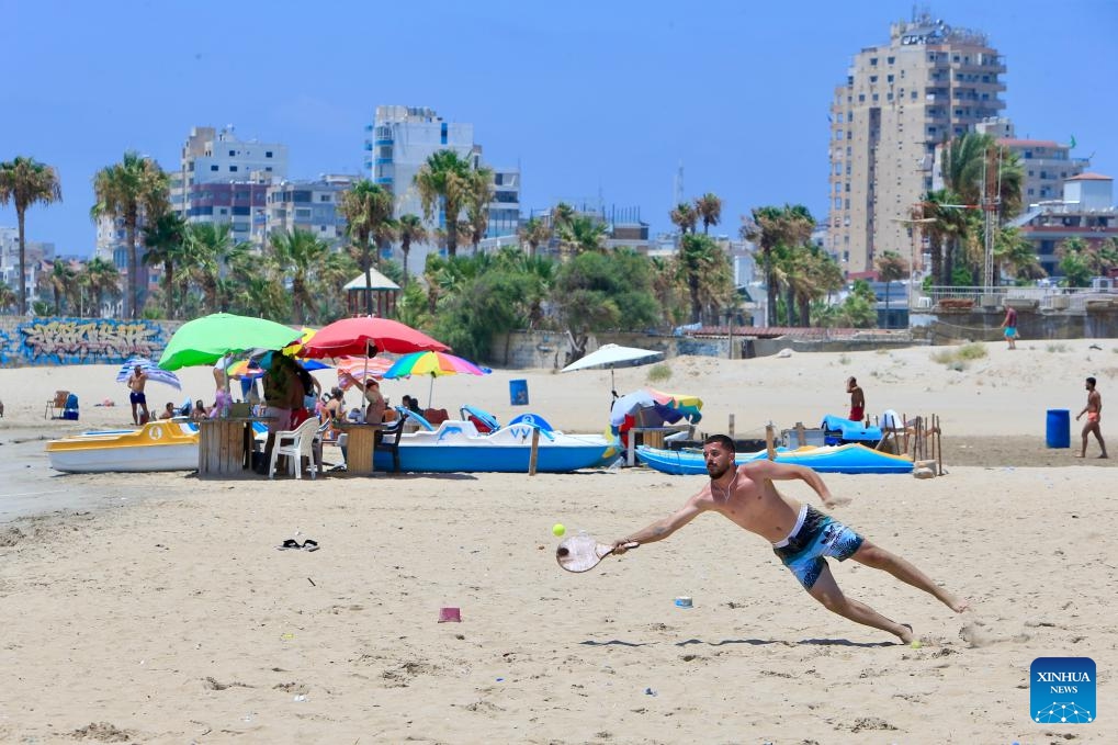 People have fun at sea in Tyre, Lebanon, July 21, 2024. (Photo: Xinhua)