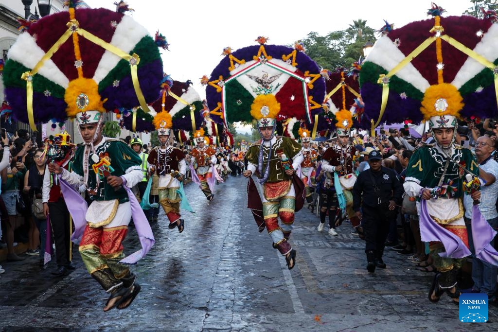 People take part in Guelaguetza in Oaxaca City, Mexico, July 20, 2024. Guelaguetza is an annual showcase of the indigenous cultures of Mexico, featured by traditional music, dance, and food. (Photo: Xinhua)